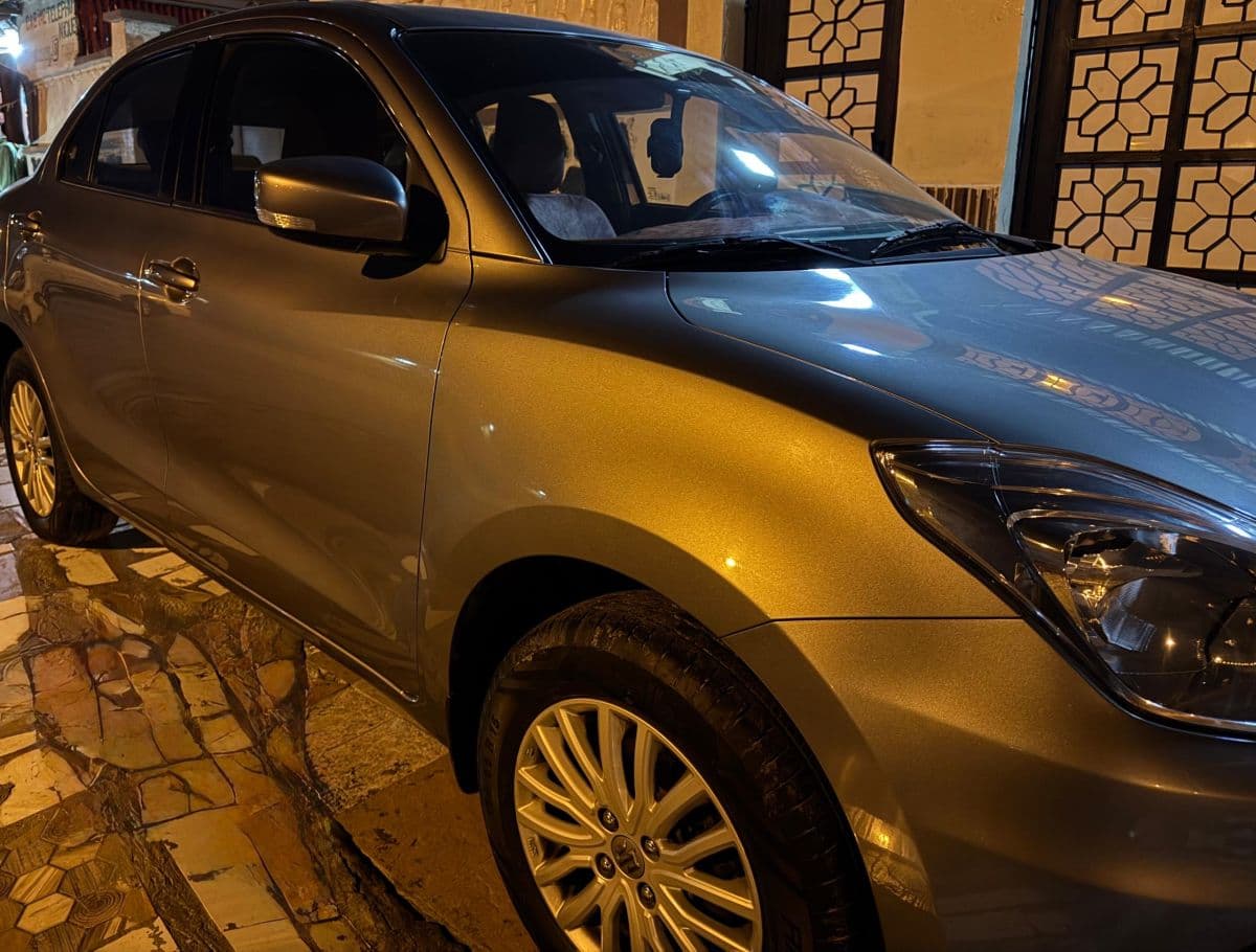 Suzuki Dzire 2024, état exceptionnel, 10 000 km, auto, essence — photo 1